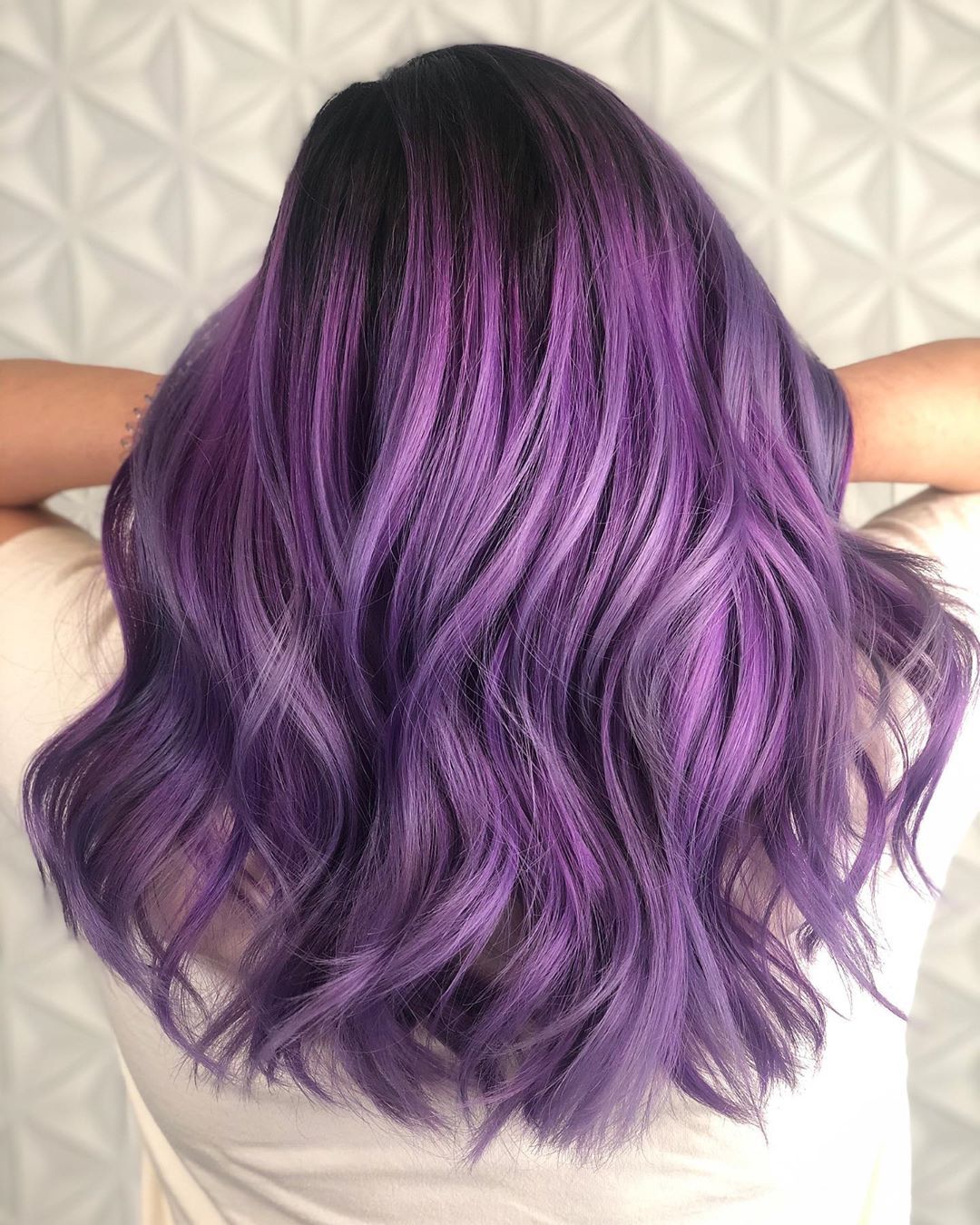 What color goes over purple hair